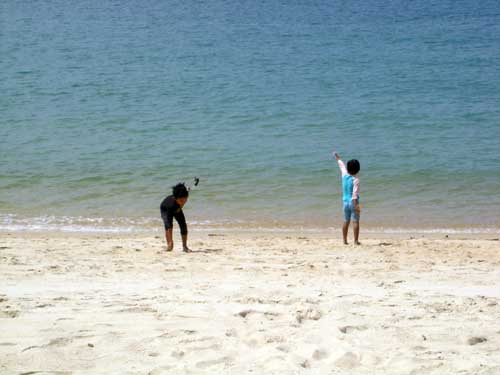 Johanna and Johan at the beach of Teluk Nipah
